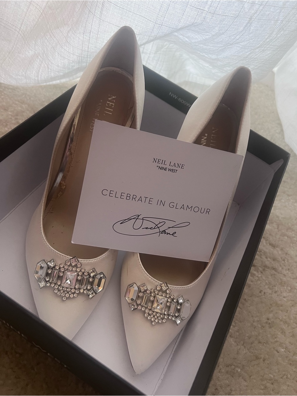 Nine West Neil Lane satin ivory pumps